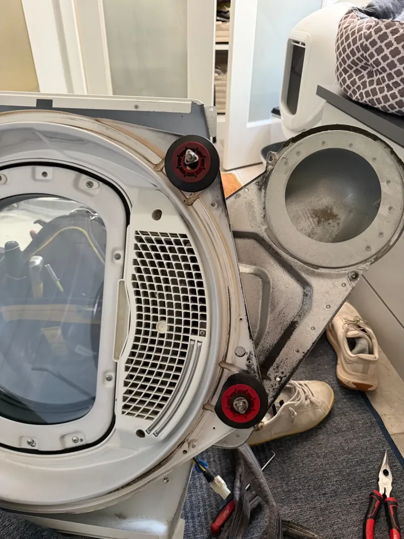 Burned dryer heating element removed during a Centennial area repair