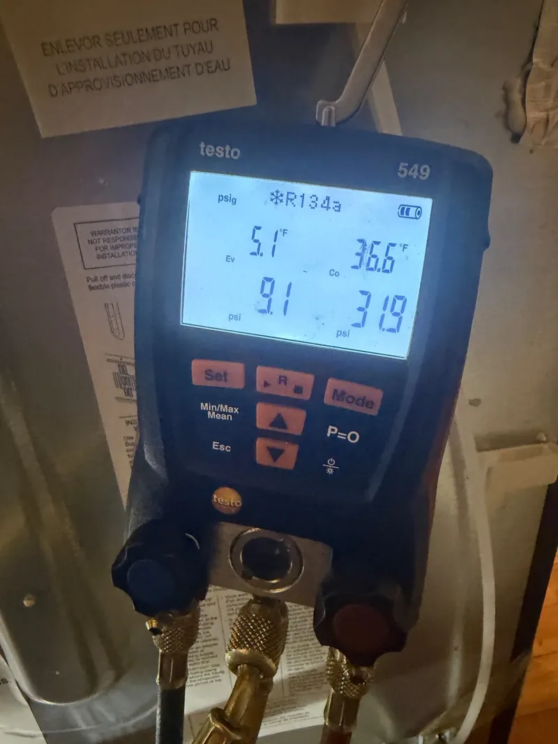 Frozen evaporator discovered during a Denver freezer repair