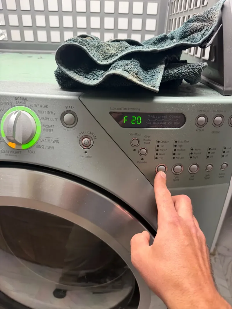 Washer displaying an F20 error during a Denver washing machine repair diagnosis