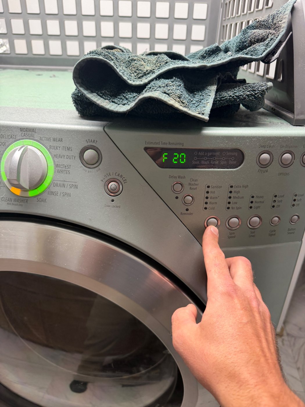Front-load washer displaying F20 during a Denver washer repair diagnosis
