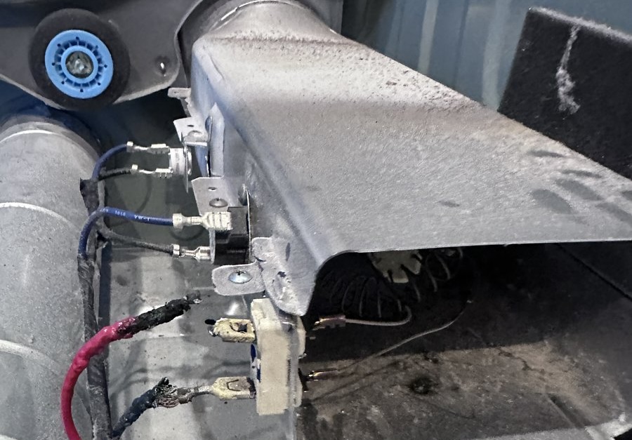 Easy Appliances Repair technician repairing a dryer in a Denver home